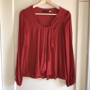 The Addison Story silk ruffle front top